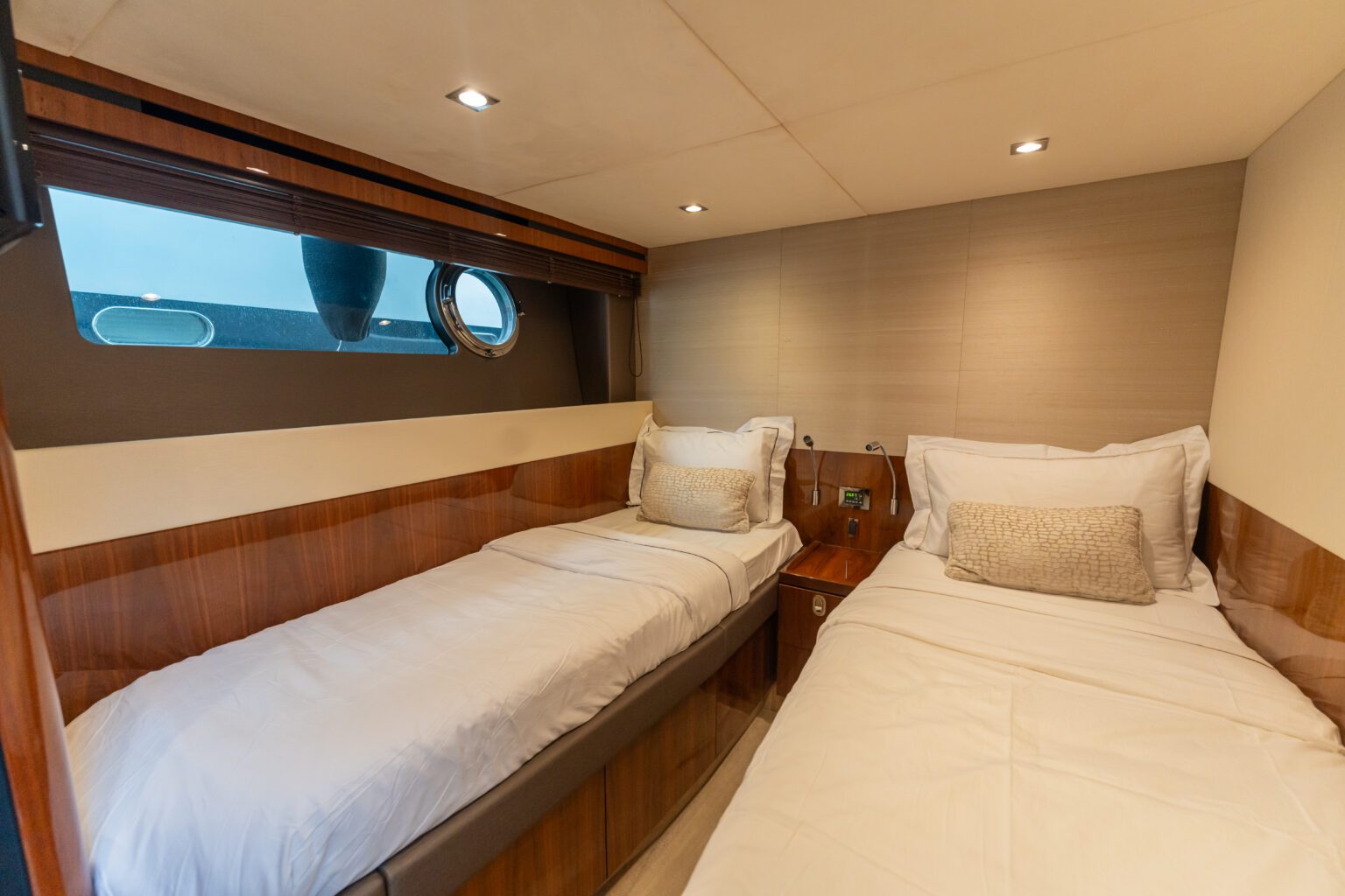 the interior of luxury yachts with twin king size bed