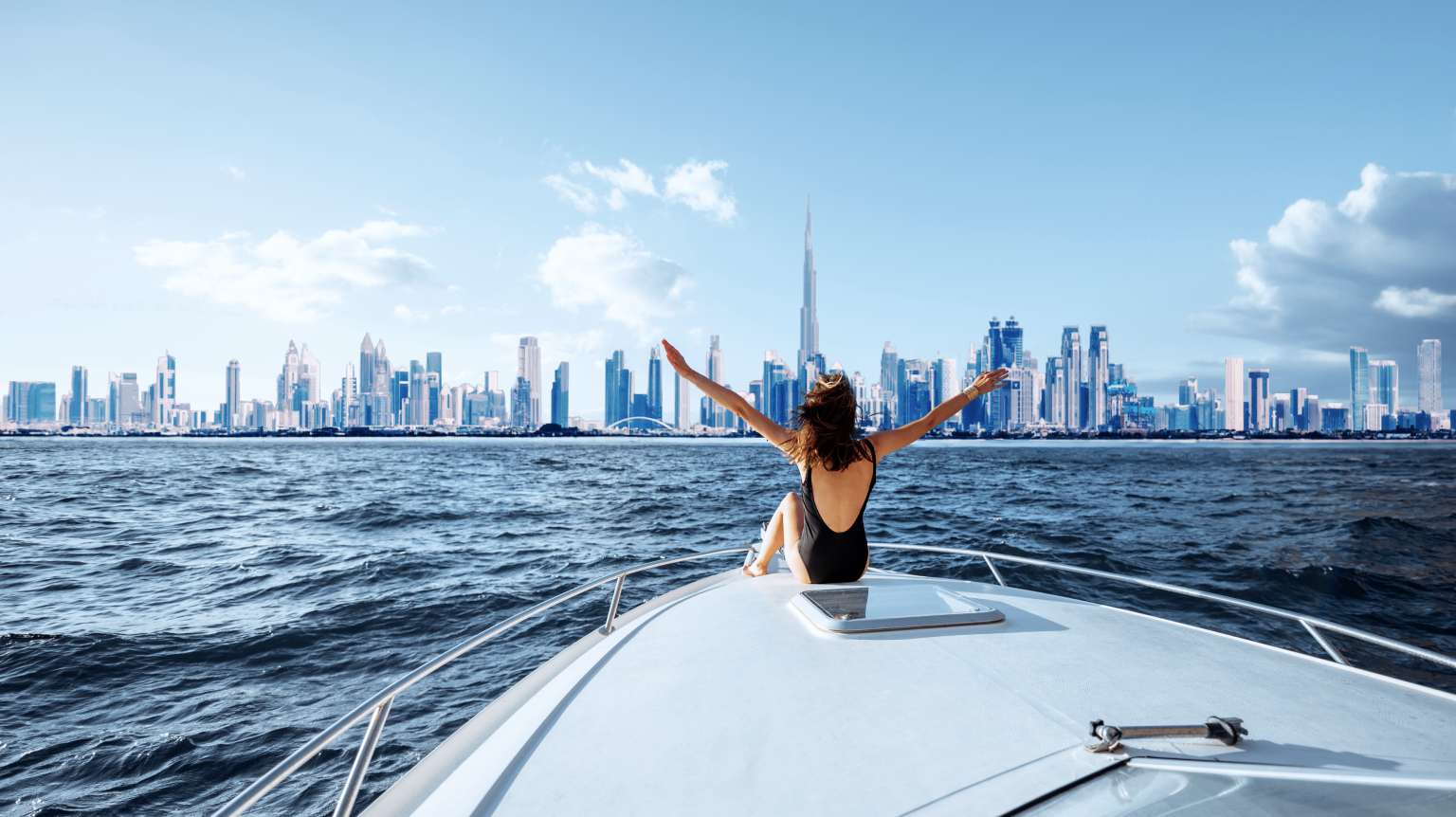 a girl enjoying yacht cruise in Dubai