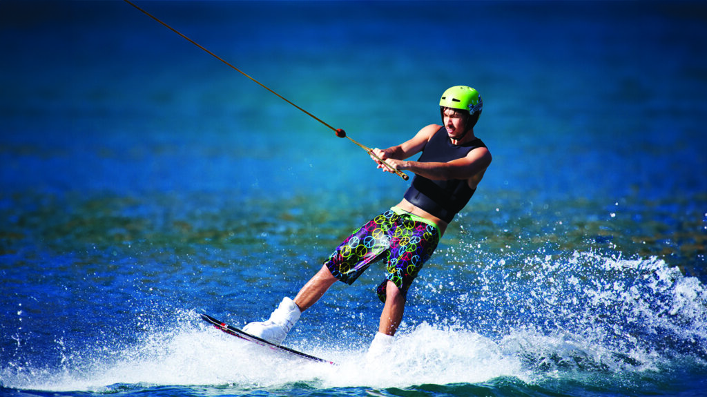 a man performing wakeboarding from top 10 watersports rental in Dubai