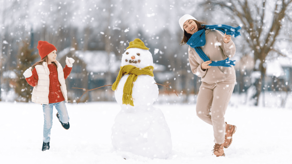 mom and child enjoying winter activities in Dubai