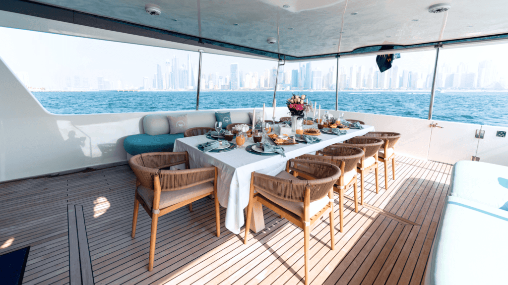 proposal party in Dubai with spacious dining arrangement on luxury yachts